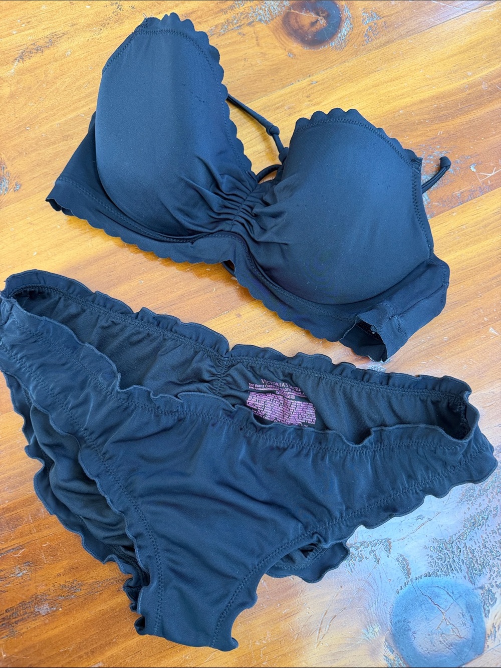 1 Victoria’s Secret black ruffle cheek bikini bottom Medium & black top 34C.